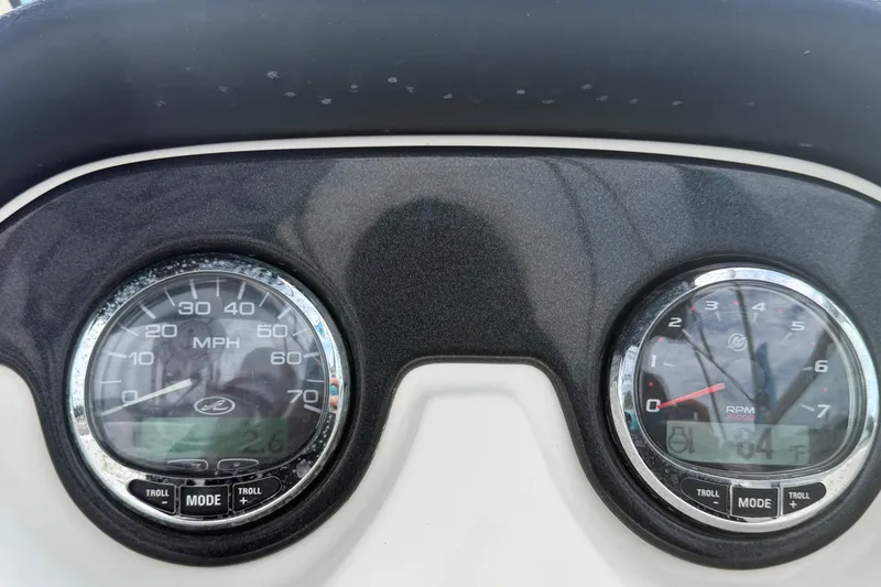 Slide: The Image of Dashboard gauges of a 2007 Sea Ray SLX 250 boat, showing speed and RPM. - 31