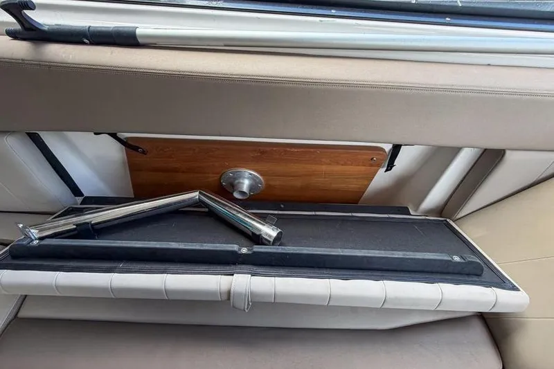 Slide: The Image of 2015 Regal 38 Express interior detail with folded table and seating. - 66