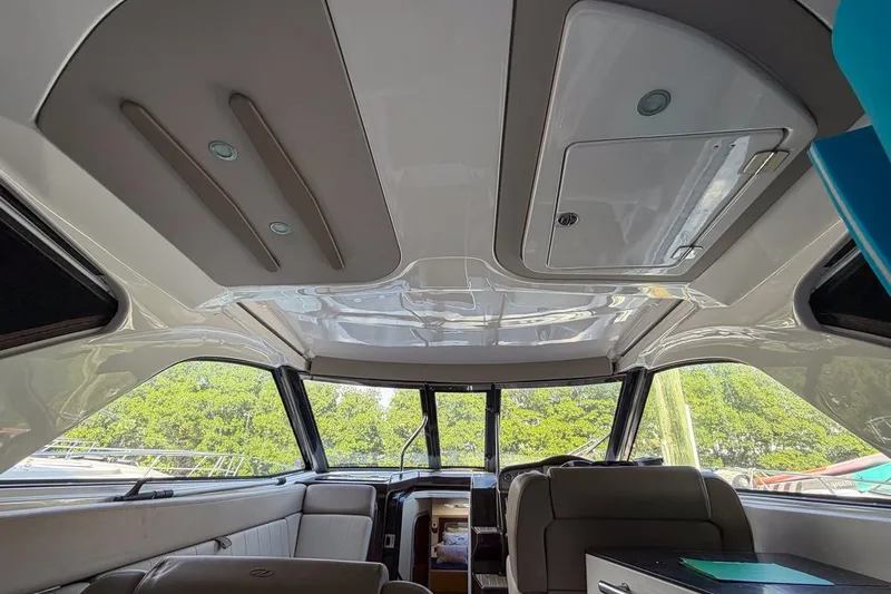 Slide: The Image of Interior view of 2015 Regal 38 Express yacht, featuring sleek design and comfortable seating. - 20