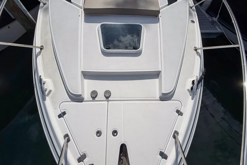 Slide: The Image of 2015 Regal 38 Express boat deck with hatch and railing, viewed from above. - 32