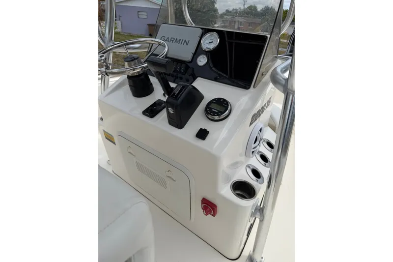 Slide: The Image of 2025 Bulls Bay 2200 XS boat console with Garmin navigation and control panel. - 23