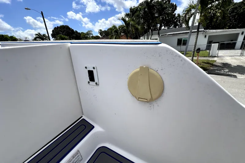 Slide: The Image of 2007 Wellcraft 35 Scarab Sport Open boat interior detail under sunny sky. - 51