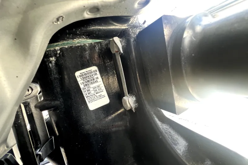 Slide: The Image of Close-up of a 2007 Wellcraft 35 Scarab Sport Open engine component with model details. - 13