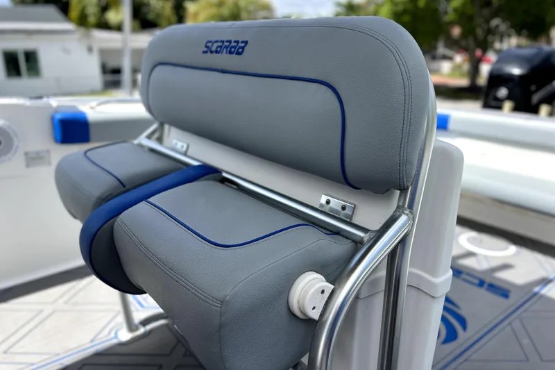 Slide: The Image of 2007 Wellcraft 35 Scarab Sport Open boat seat with gray and blue upholstery. - 52