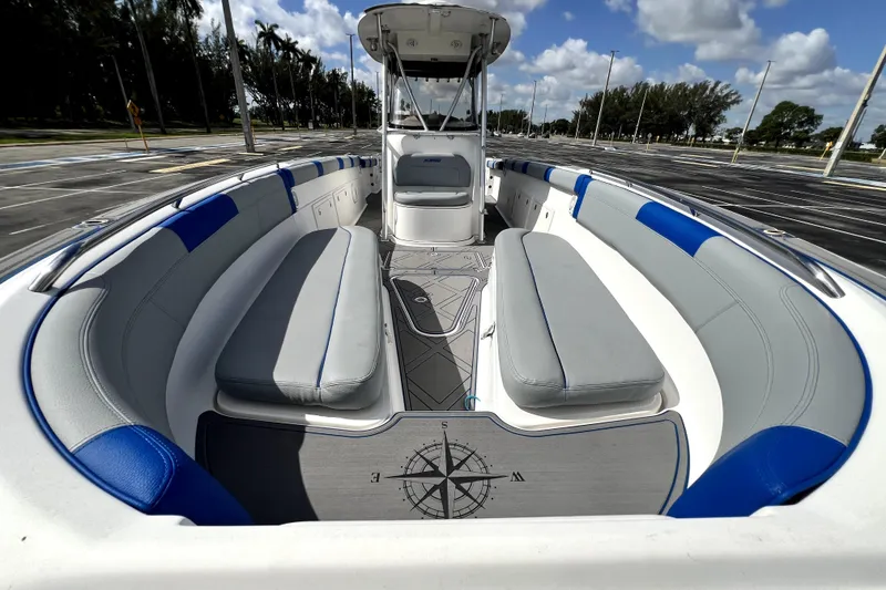 Slide: The Image of 2007 Wellcraft 35 Scarab Sport Open boat interior with blue and gray seating. - 109