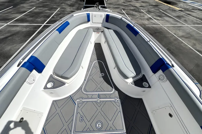 Slide: The Image of 2007 Wellcraft 35 Scarab Sport Open boat interior with cushioned seating and sleek design. - 79