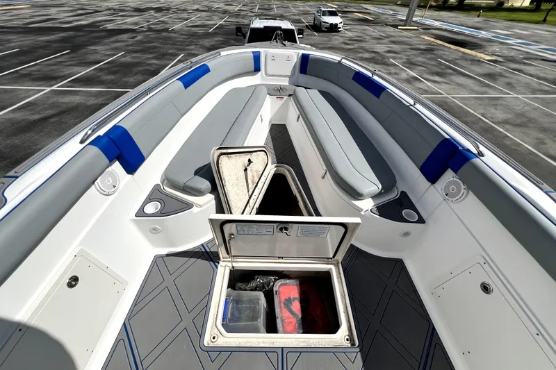 Slide: The Image of 2007 Wellcraft 35 Scarab Sport Open boat interior with open storage compartment. - 85