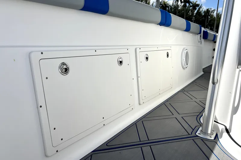 Slide: The Image of 2007 Wellcraft 35 Scarab Sport Open boat interior with storage compartments. - 75