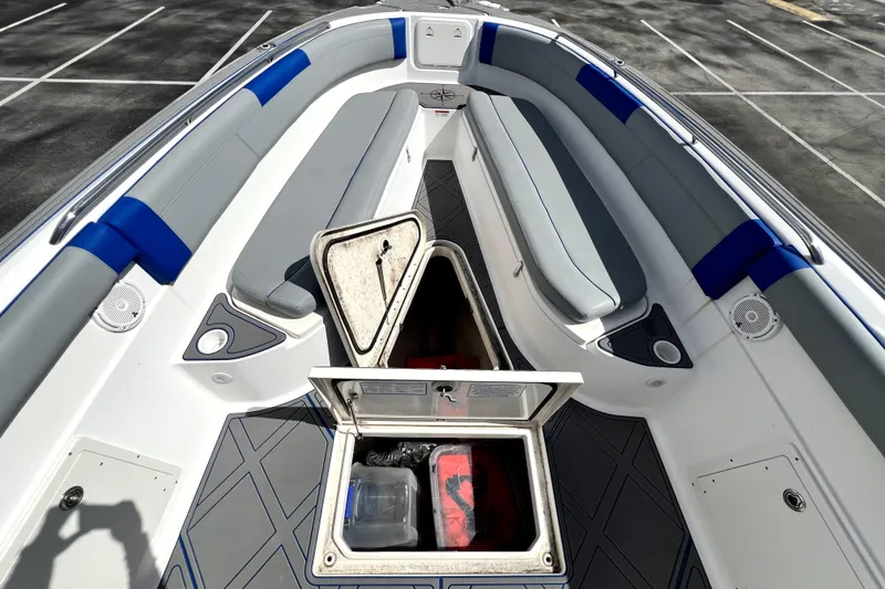 Slide: The Image of 2007 Wellcraft 35 Scarab Sport Open boat interior with open storage compartment. - 81
