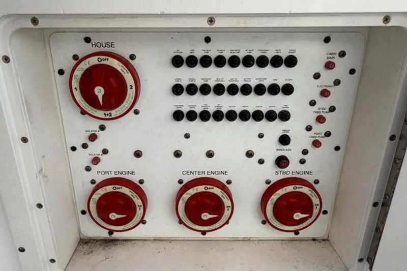 Slide: The Image of Control panel of a 2007 Wellcraft 35 Scarab Sport Open boat with switches and dials. - 26