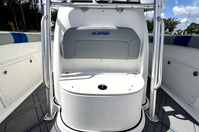 Slide: The Image of 2007 Wellcraft 35 Scarab Sport Open boat interior with seating and storage. - 87