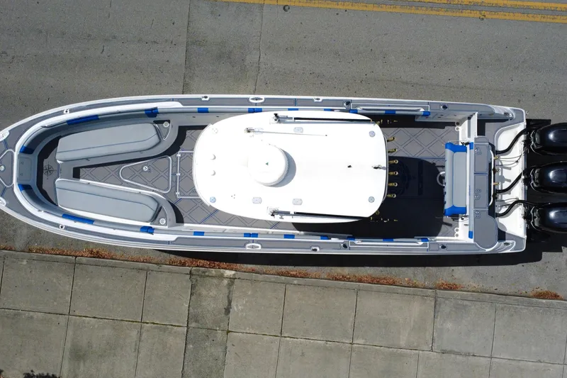 Slide: The Image of Overhead view of 2007 Wellcraft 35 Scarab Sport Open boat on pavement. - 25