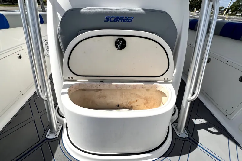 Slide: The Image of 2007 Wellcraft 35 Scarab Sport Open boat with open storage compartment. - 82