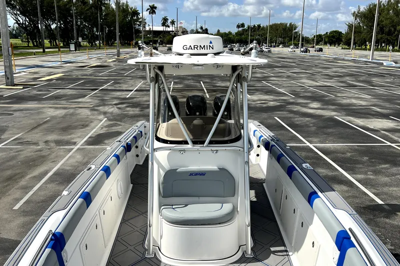 Slide: The Image of 2007 Wellcraft 35 Scarab Sport Open boat in empty parking lot, featuring Garmin equipment. - 110
