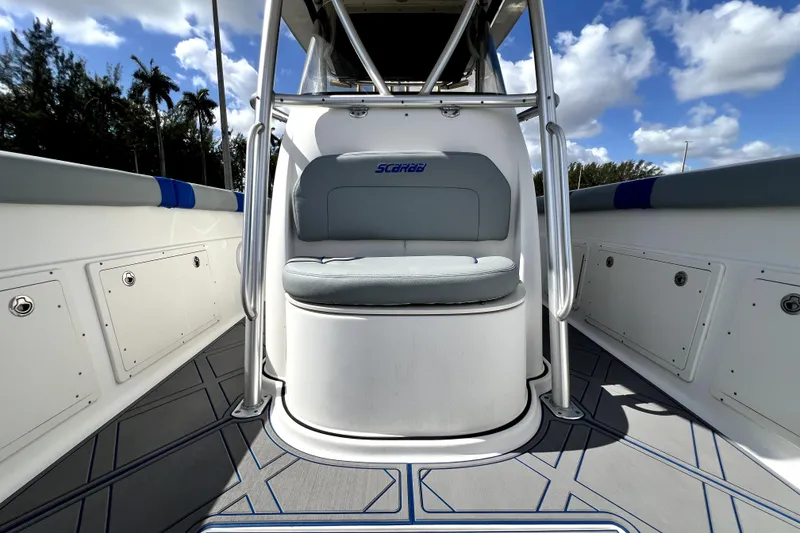 Slide: The Image of 2007 Wellcraft 35 Scarab Sport Open boat interior with seating and storage compartments. - 96