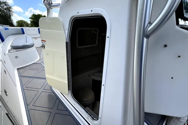Slide: The Image of 2007 Wellcraft 35 Scarab Sport Open boat interior with open cabin door. - 70