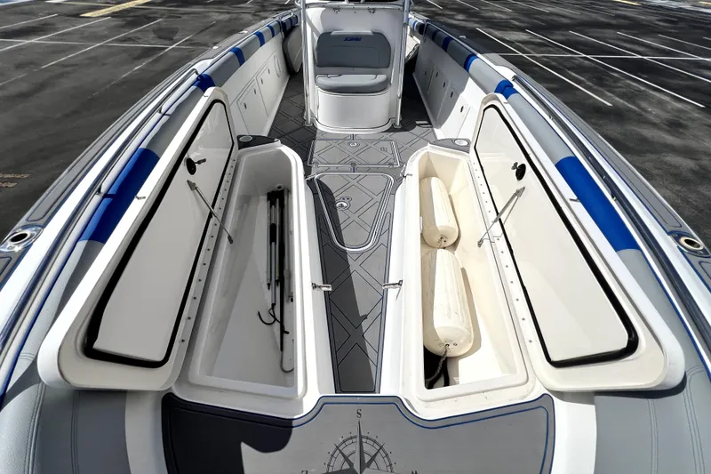 Slide: The Image of 2007 Wellcraft 35 Scarab Sport Open boat interior with open storage compartments. - 98