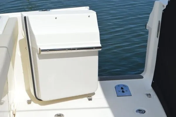 Slide: The Image of 2022 Boston Whaler 280 Vantage boat deck with seating and water view. - 13