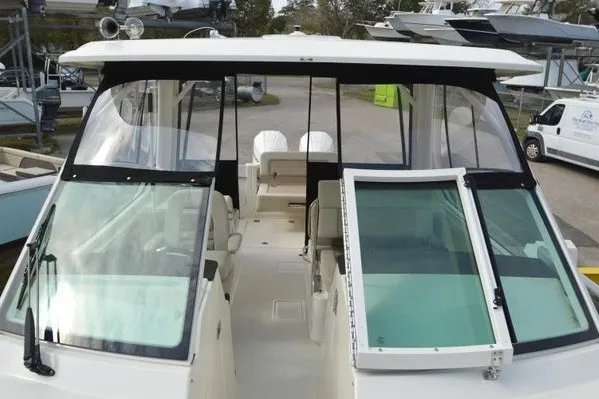 Slide: The Image of 2022 Boston Whaler 280 Vantage boat with spacious deck and modern design. - 30