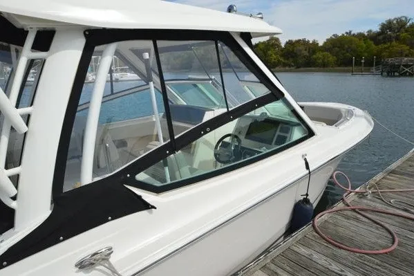 Slide: The Image of 2022 Boston Whaler 280 Vantage docked, showcasing sleek design and modern features. - 5