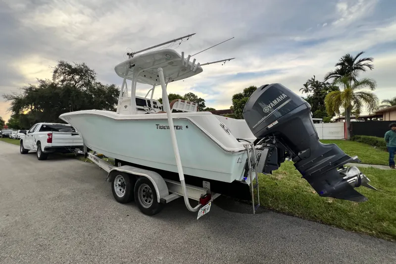 Slide: The Image of 2015 Tidewater 250 CC Adventure boat on trailer, equipped with Yamaha outboard motor. - 5