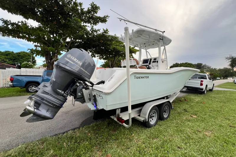 Slide: The Image of 2015 Tidewater 250 CC Adventure boat on trailer with Yamaha outboard motor. - 10
