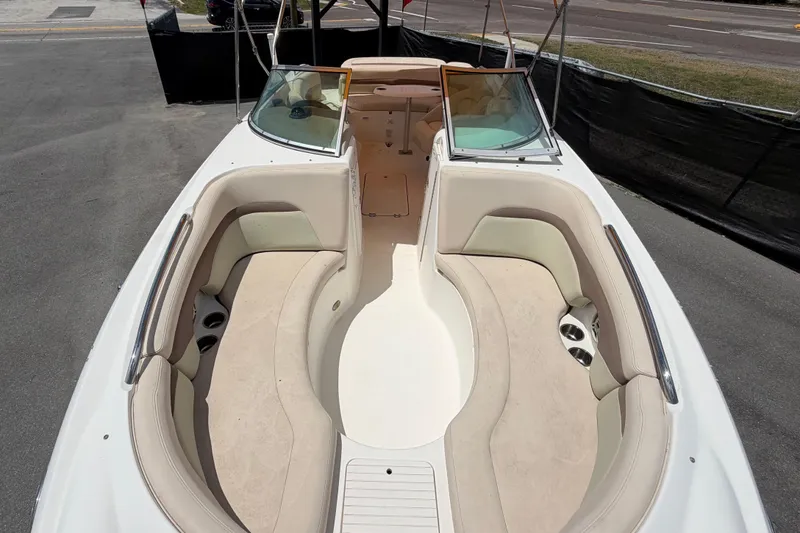 Slide: The Image of 2006 Chaparral Sunesta 236 boat interior with spacious seating and cup holders. - 69