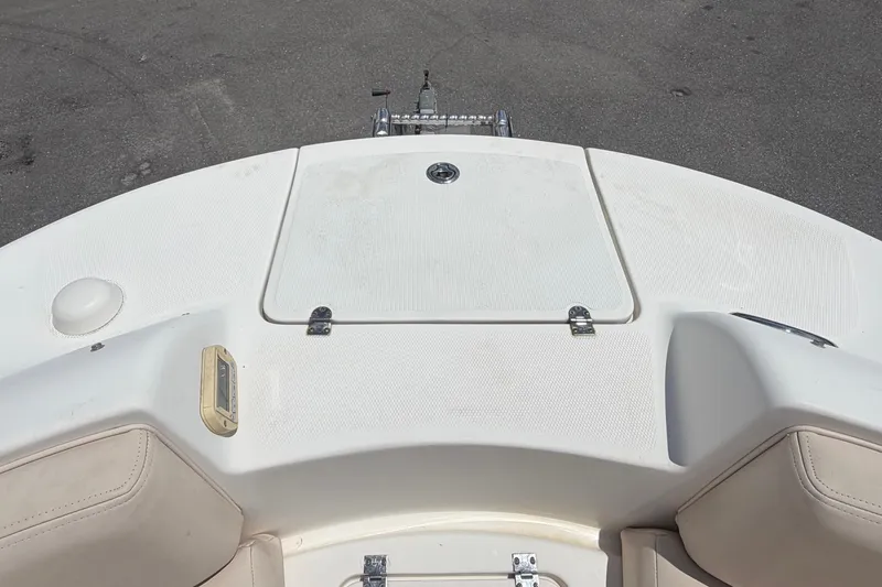 Slide: The Image of 2006 Chaparral Sunesta 236 boat deck with storage compartment and seating. - 65