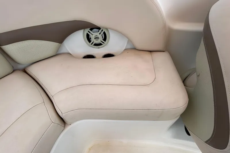 Slide: The Image of 2006 Chaparral Sunesta 236 boat interior seating with speaker detail. - 86