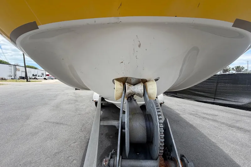 Slide: The Image of 2006 Chaparral Sunesta 236 boat on trailer, showing hull and propeller. - 13