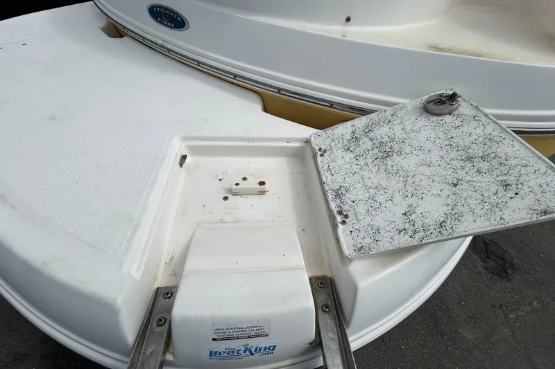 Slide: The Image of 2006 Chaparral Sunesta 236 boat swim platform with extended plane and ladder. - 97