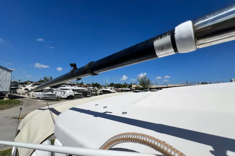 Slide: The Image of 2006 Grady-White Express 330 boat detail with clear blue sky background. - 52