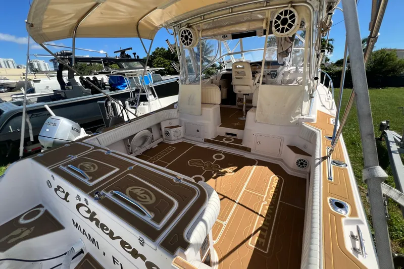 Slide: The Image of 2006 Grady-White Express 330 boat interior with custom flooring, docked in Miami, Florida. - 53
