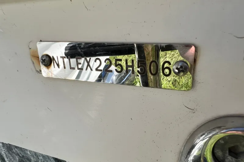Slide: The Image of 2006 Grady-White Express 330 boat hull identification number plate. - 57