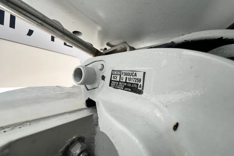 Slide: The Image of Close-up of Yamaha F300UCA engine part on 2006 Grady-White Express 330 boat. - 61