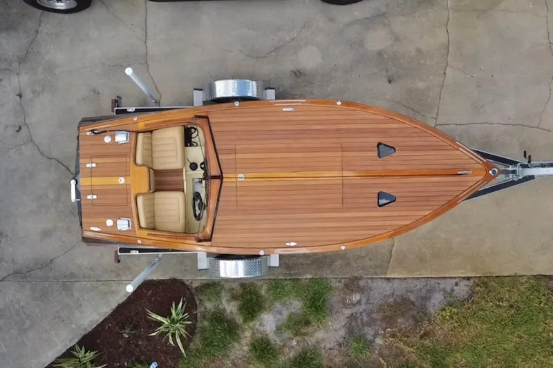 Slide: The Image of Overhead view of 2025 Custom Line 17 wooden boat on trailer. - 10