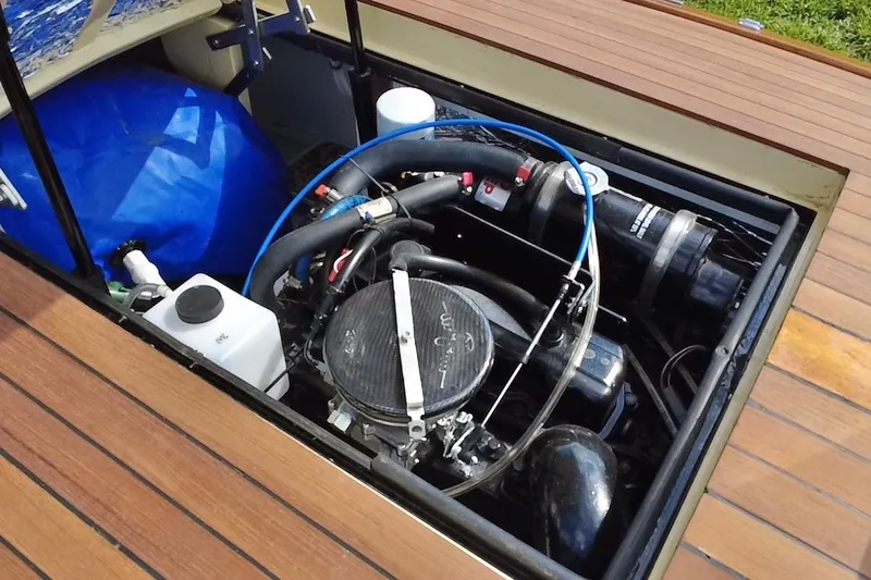 Slide: The Image of Engine compartment of 2025 Custom Line 17 boat, showcasing detailed mechanical components. - 21
