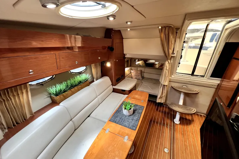 Slide: The Image of Luxurious interior of 2006 Regal Commodore 3560 IB yacht with elegant seating and decor. - 84