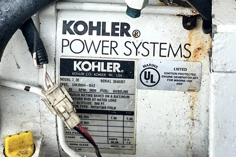 Slide: The Image of Kohler marine generator label on a 2006 Regal Commodore 3560 IB boat. - 62