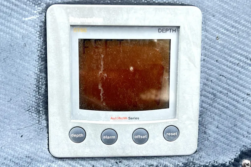 Slide: The Image of Raymarine depth gauge on 2006 Regal Commodore 3560 IB boat dashboard. - 43