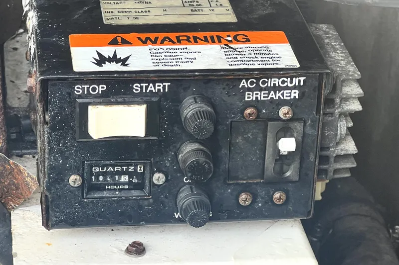 Slide: The Image of Control panel of a 2006 Regal Commodore 3560 IB boat with warning label. - 64