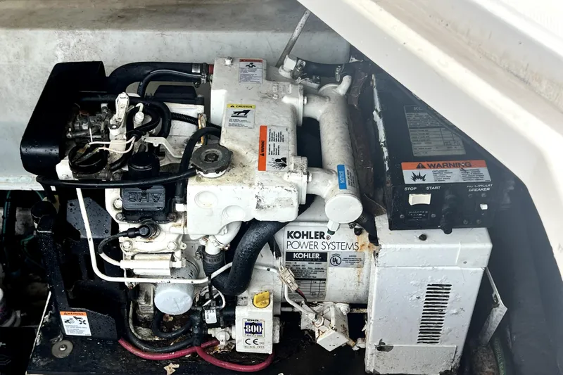 Slide: The Image of Engine compartment of a 2006 Regal Commodore 3560 IB with Kohler power systems. - 65