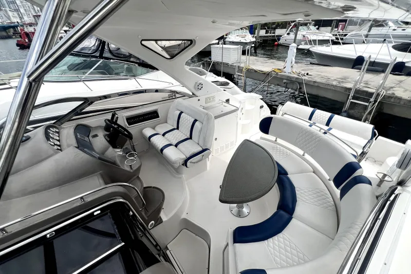 Slide: The Image of Luxurious 2006 Regal Commodore 3560 IB yacht interior with plush seating and sleek design. - 16