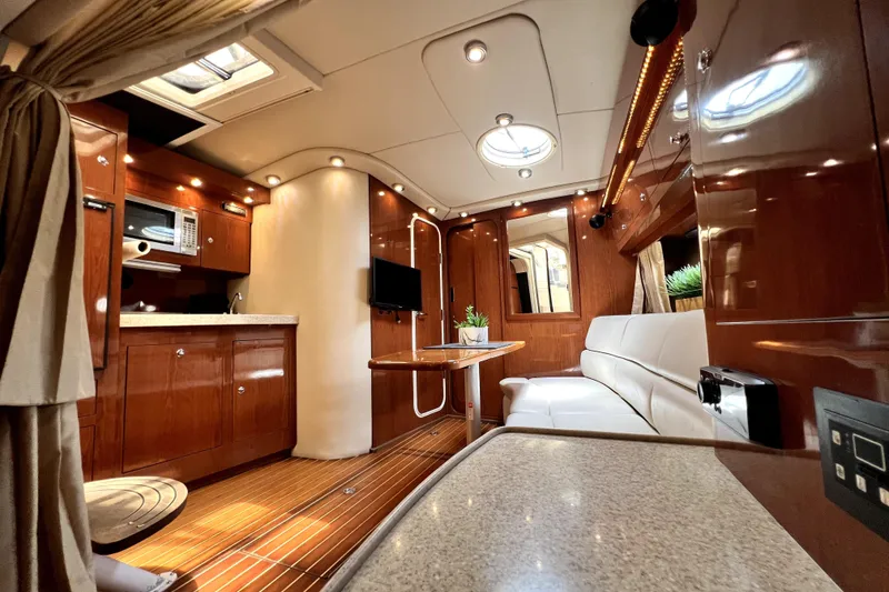 Slide: The Image of Luxurious interior of 2006 Regal Commodore 3560 IB yacht with modern amenities and elegant design. - 81