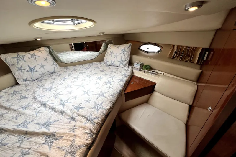 Slide: The Image of Luxurious cabin interior of 2006 Regal Commodore 3560 IB yacht with starfish bedding. - 36