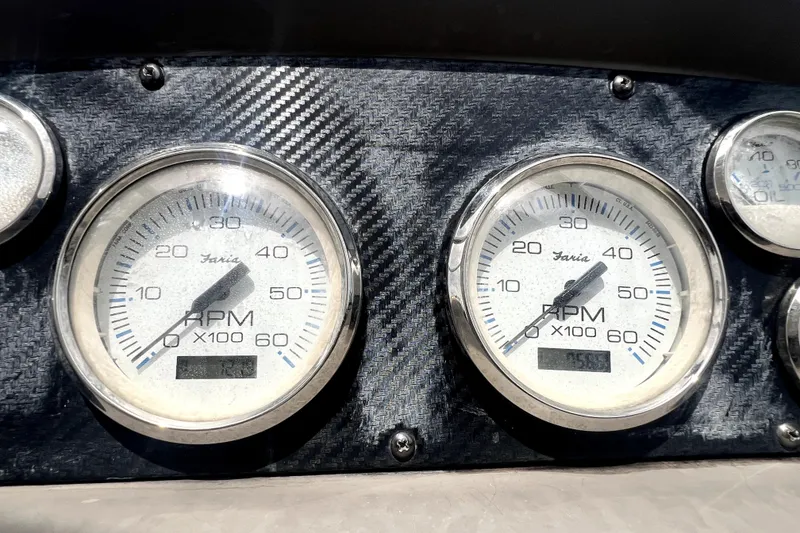Slide: The Image of Close-up of RPM gauges on a 2006 Regal Commodore 3560 IB boat dashboard. - 15