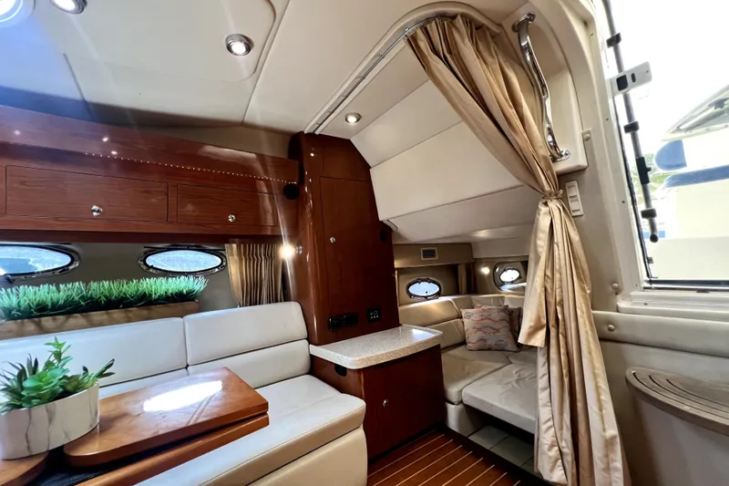 Slide: The Image of Luxurious interior of 2006 Regal Commodore 3560 IB yacht with elegant seating and decor. - 80