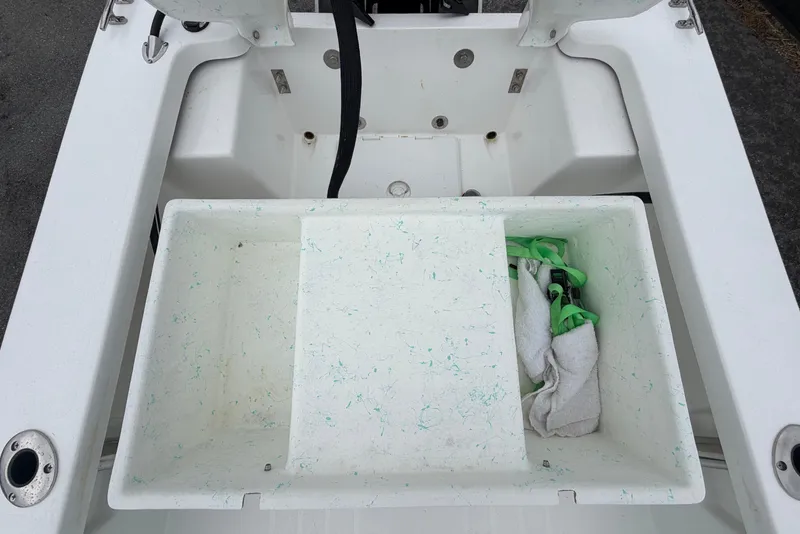 Slide: The Image of The image shows the storage compartment of a 2025 Exuma 14 Snookaholic boat. - 46