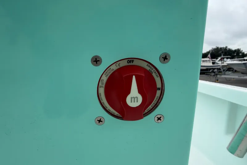 Slide: The Image of Close-up of Exuma 14 Snookaholic 2025 boat switch panel. - 22