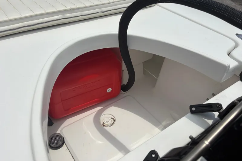 Slide: The Image of 2025 Exuma 14 Snookaholic boat interior with red Suzuki fuel tank. - 27